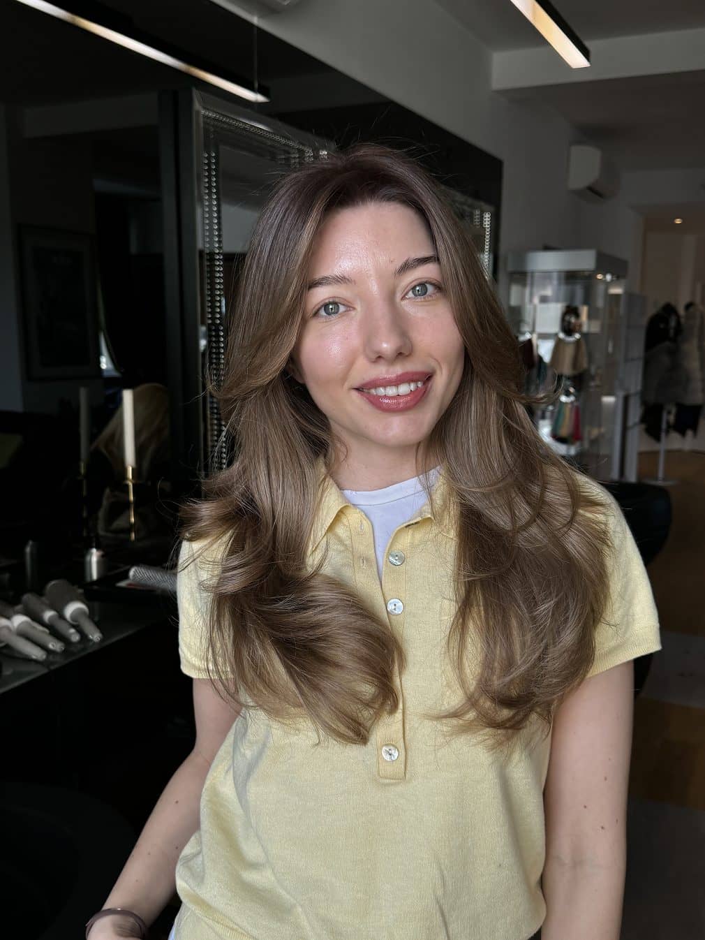 Guest with brown hair and curtain bangs