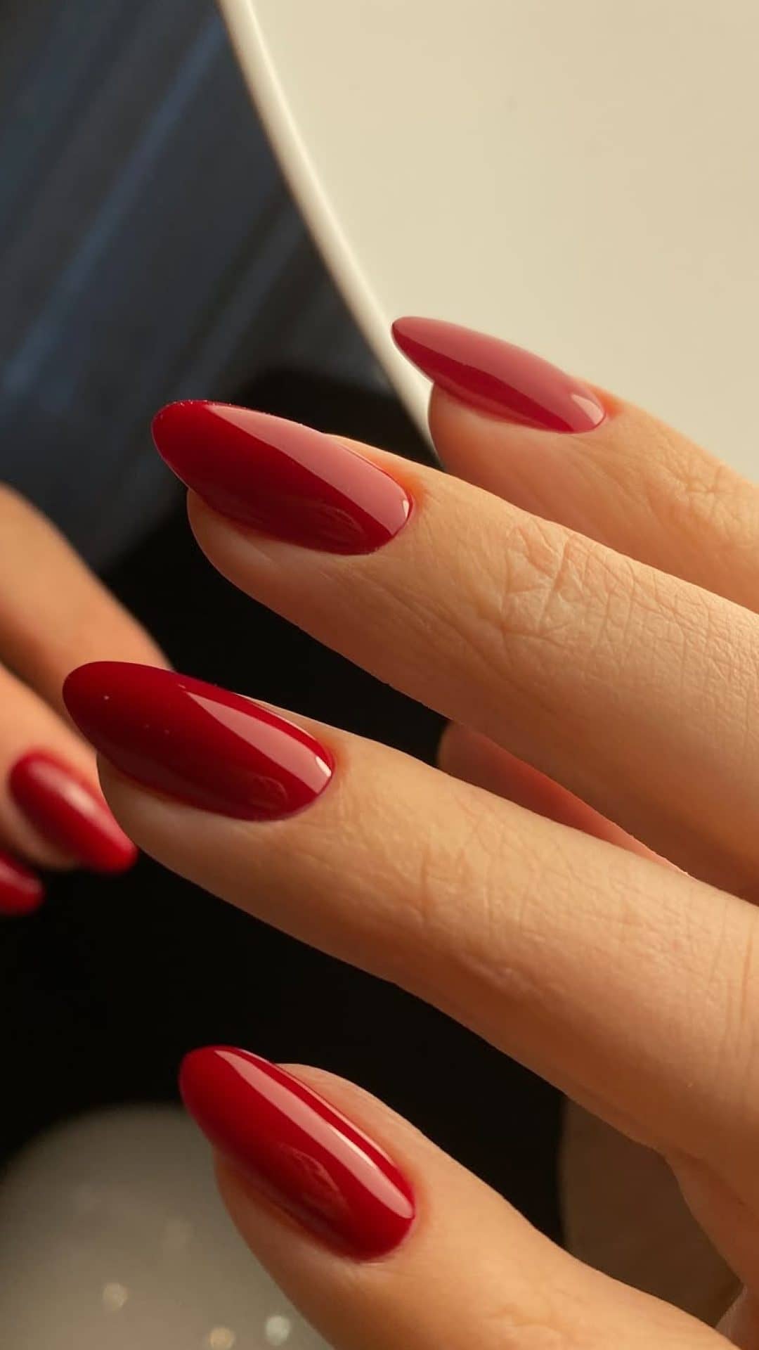 Long red almond nails
